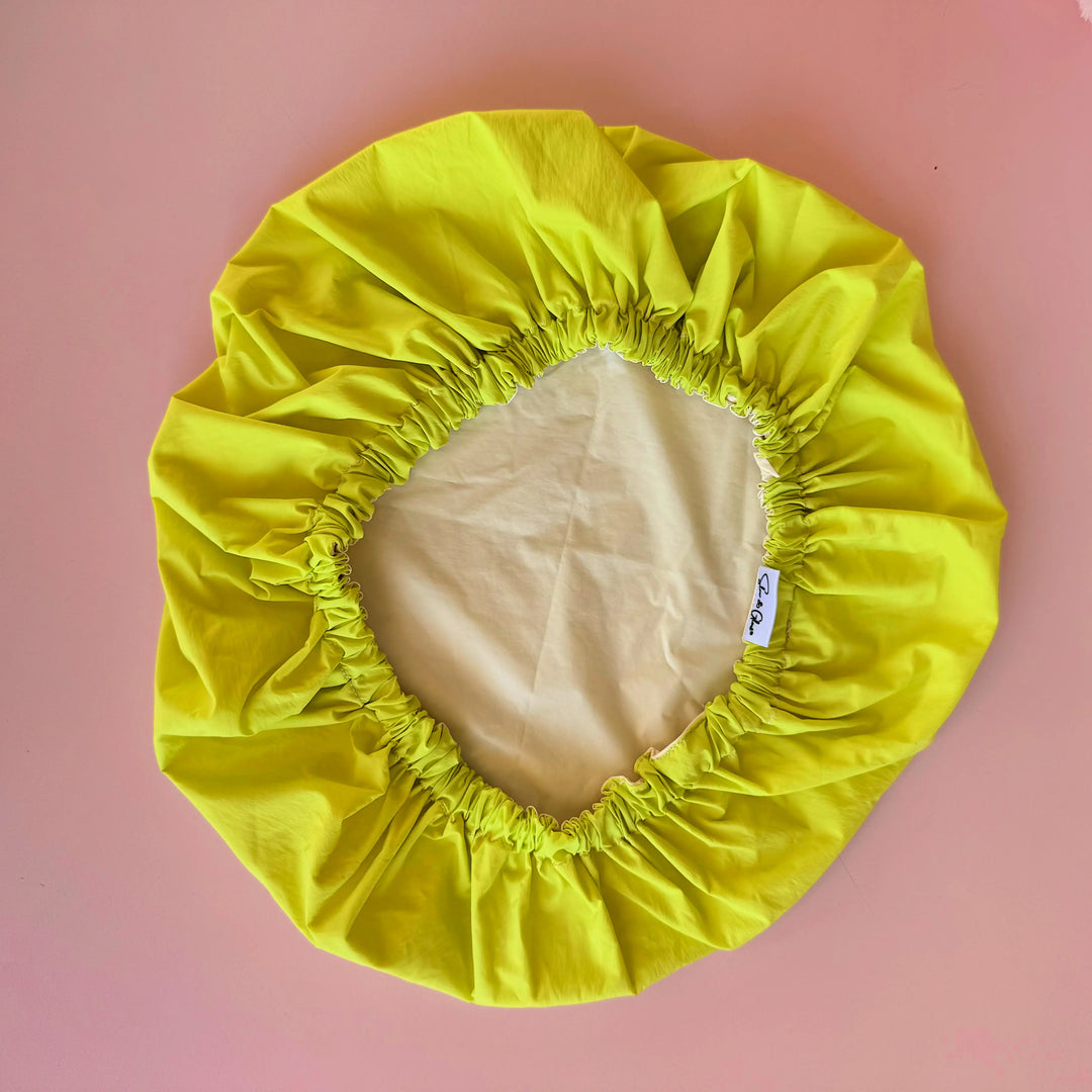 bonnet de douche en tissu upcyclé, fabriqué en France en atelier d’insertion, alternative éthique au plastique
